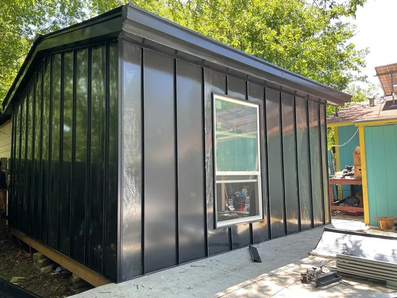 Black standing seam metal wall panels for Roof Inspection in Moraine