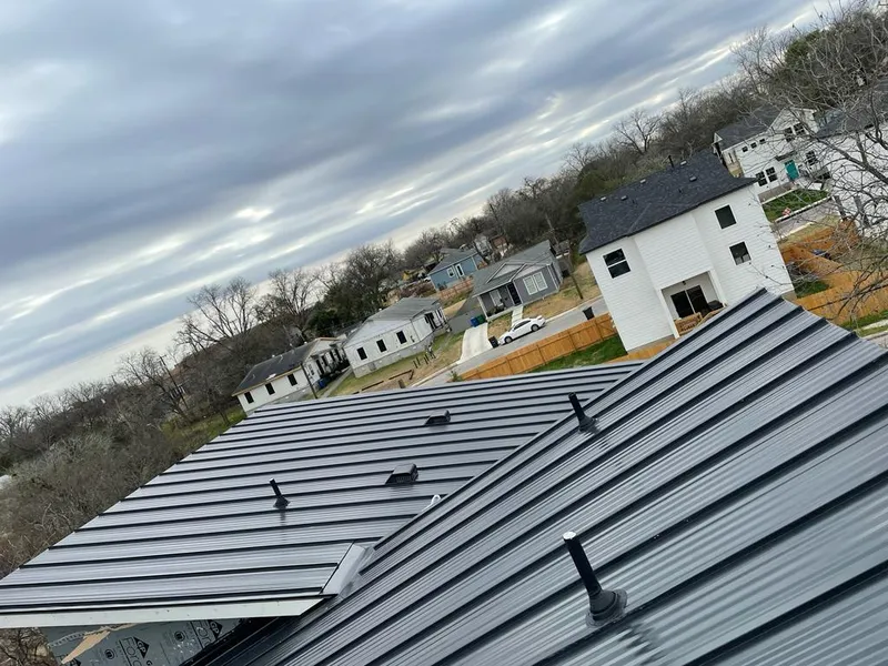 Standing seam metal roof panels with vents for Skylight Repair in Moraine